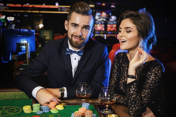 Studio kasino live Dream Gaming dengan meja dealer profesional dan kamera multi-sudut